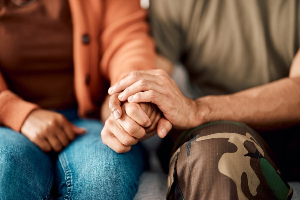 The military-affiliated woman and her partner seek advice for relationship problems and potential divorce. 